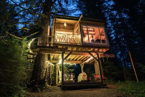 Disconnect from the world in a waterfront treehouse retreat in a magical forest